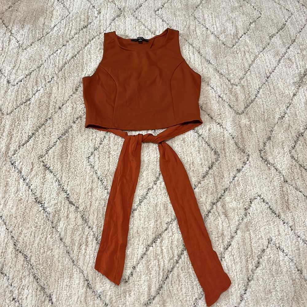 Lulus— “Let's Tie It Rust Orange Tie-Back Cropped Tank Top”